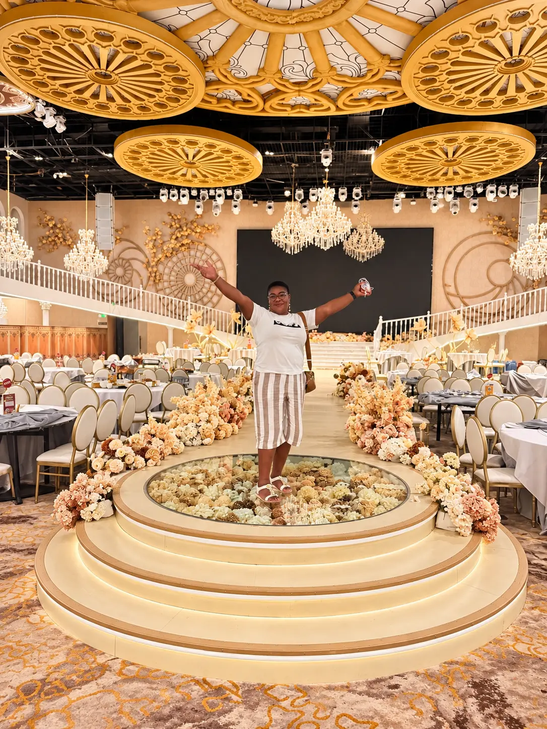Atinuke celebrating in an elegant event space